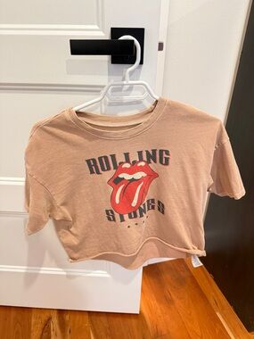 the Rolling Stones Beige Crop Tee with Red Tongue Graphic